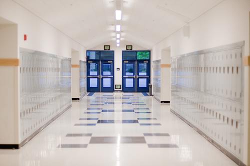 Empty school hallway with lockers