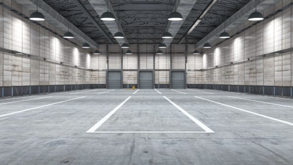 An empty warehouse with markings on the floor