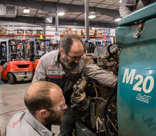 Technician_Working_Sweeper_Scrubber_Repair_3