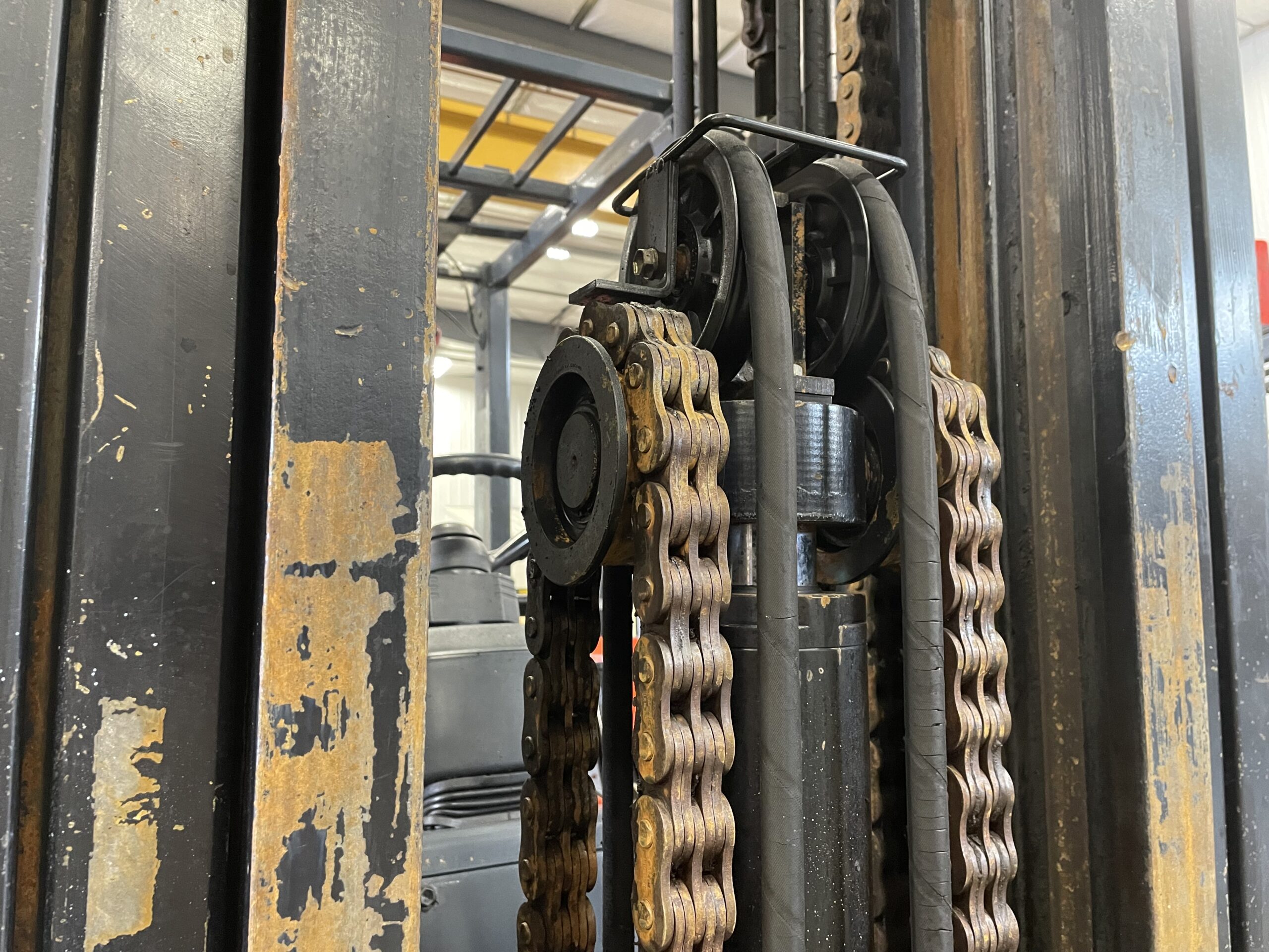 worn and rusty forklift chains in poor condition