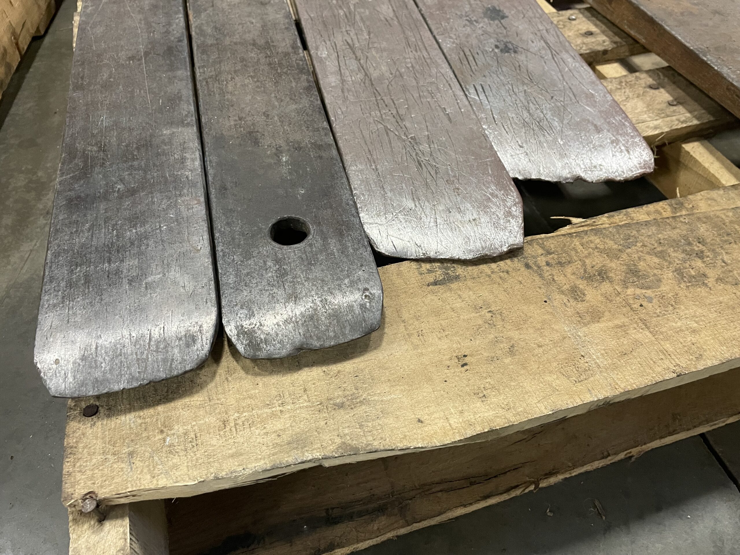 worn forklift forks on a pallet